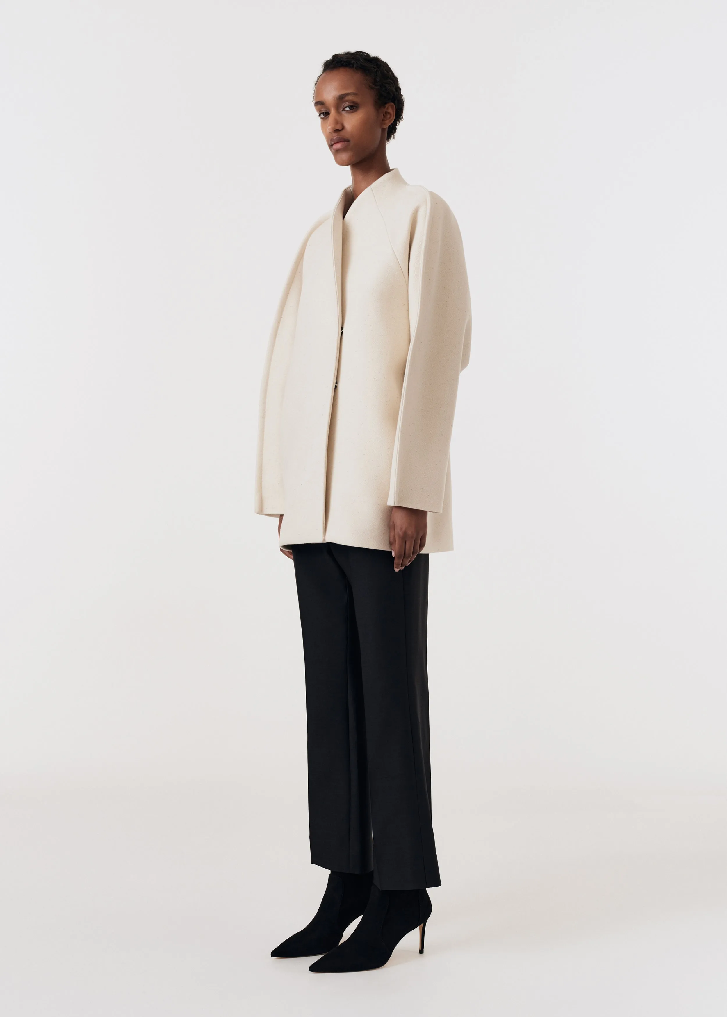 Curved seam coat