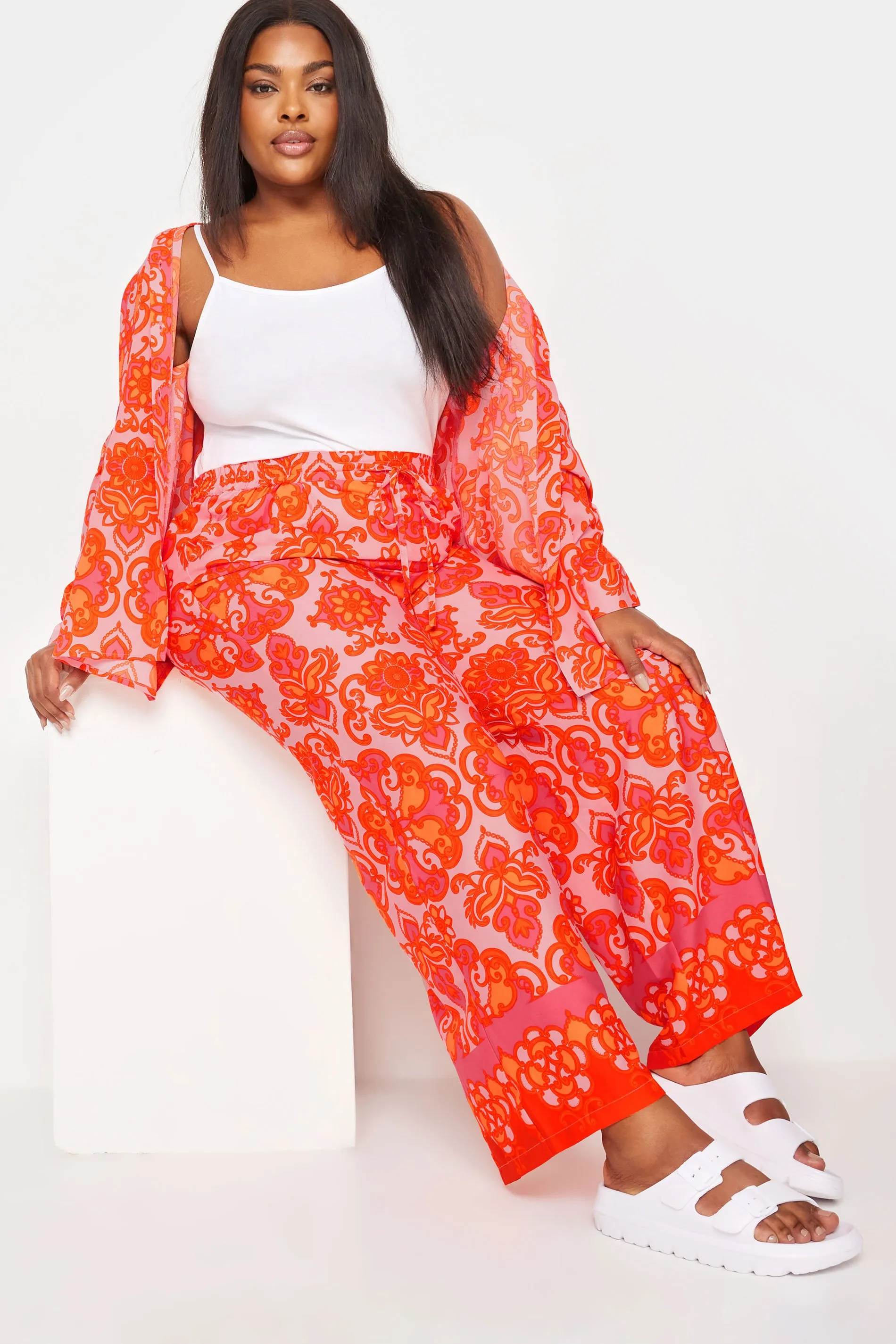 LIMITED COLLECTION Curve Orange Abstract Print Wide Leg Trousers