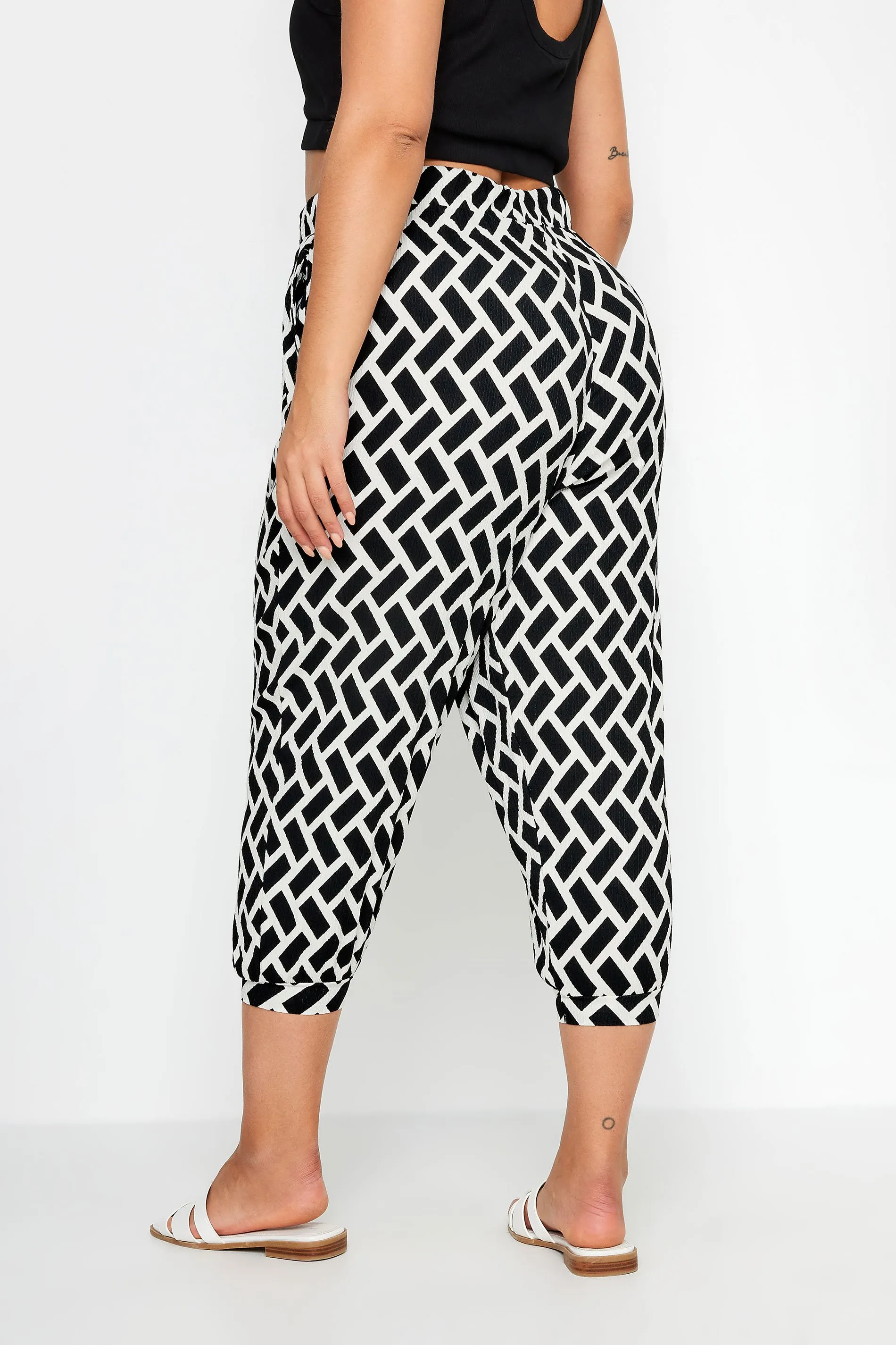 YOURS Curve Black Geometric Print Textured Cropped Harem Trousers